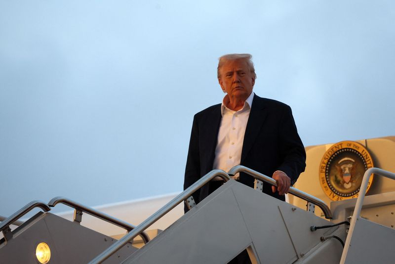U.S. President Donald Trump exits Air Force One upon arriving at Joint Base Andrews, while on his way back to the White House after a weekend in West Palm Beach, Florida, at Joint Base Andrews in Maryland, U.S., May 4, 2025. REUTERS/Leah Millis/File Photo