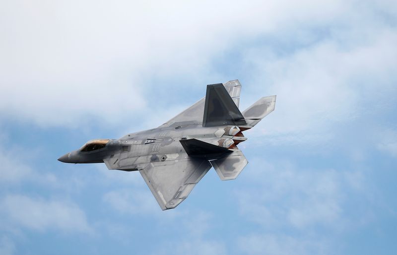 FILE PHOTO: A Lockheed Martin F-22 Raptor fighter turns during a flying display at the Royal International Air Tattoo at Fairford, Britain July 8, 2016.  REUTERS/Peter Nicholls/File Photo