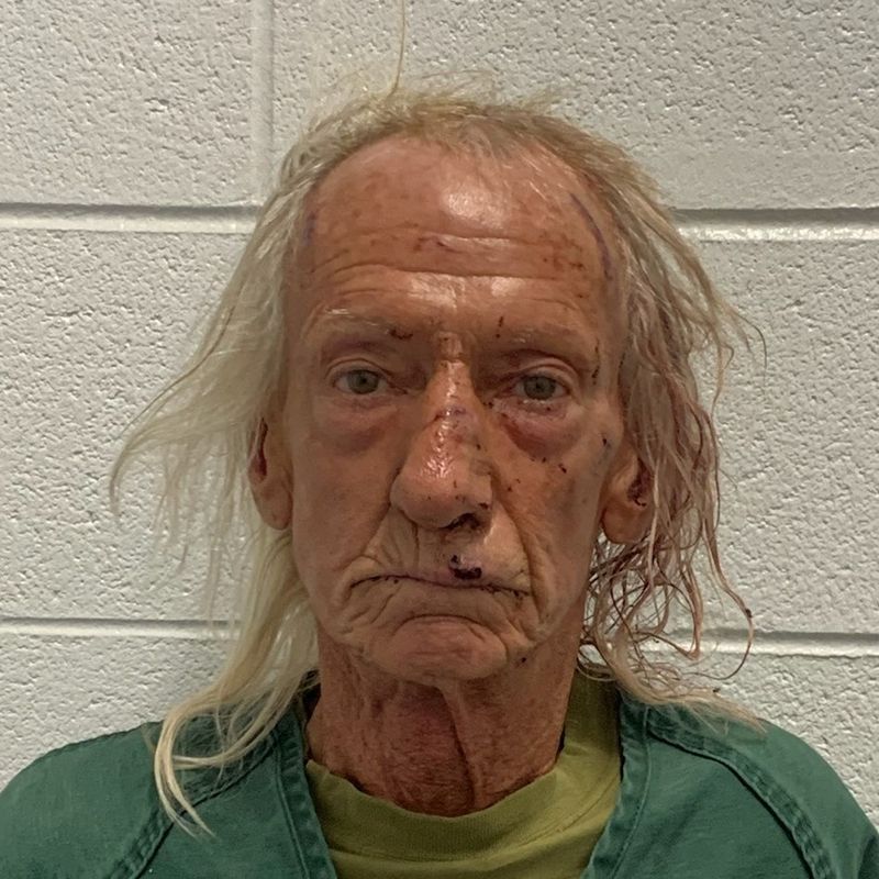 Joseph M. Czuba poses for a police booking photograph after being arrested by the Will County Sheriff’s Office in Illinois