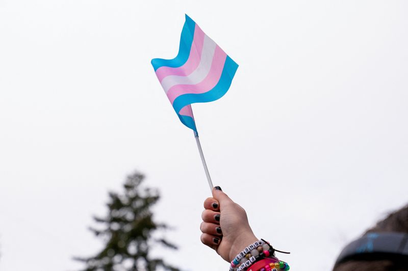 Demonstrators rally in support of trans youth at Seattle Children’s hospital