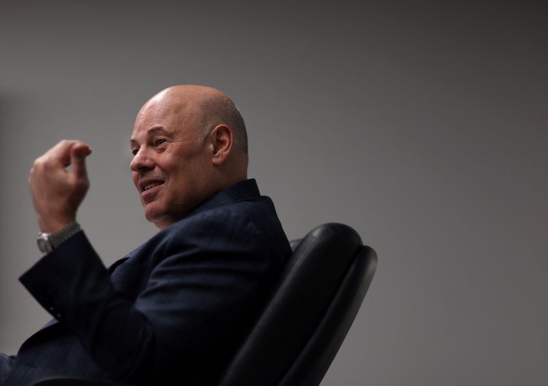 FILE PHOTO: U.S. Postmaster General Louis DeJoy responds to a question during an interview with Reuters at the U.S. Postal Service Headquarters in Washington, U.S., April 20, 2022. Picture taken April 20, 2022. REUTERS/Leah Millis/File Photo