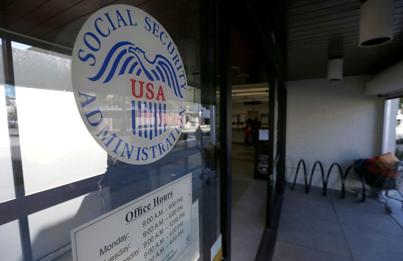 FILE PHOTO: The entrance and logo of a Social Security Office in Pasadena, California U.S., March 14, 2017. REUTERS/Mario Anzuoni/File Photo