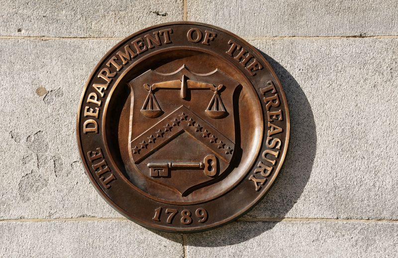FILE PHOTO: A bronze seal for the Department of the Treasury is shown at the U.S. Treasury building in Washington, U.S., January 20, 2023.  REUTERS/Kevin Lamarque/File Photo