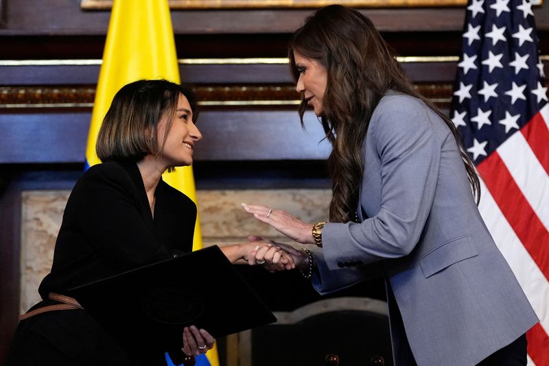 U.S. Homeland Security Secretary Kristi Noem and Colombian Foreign Minister Laura Sarabia shake hands after signing a Biometric Data Sharing Program Letter of Intent in Bogota, Colombia, March 27, 2025.  Alex Brandon/Pool via REUTERS