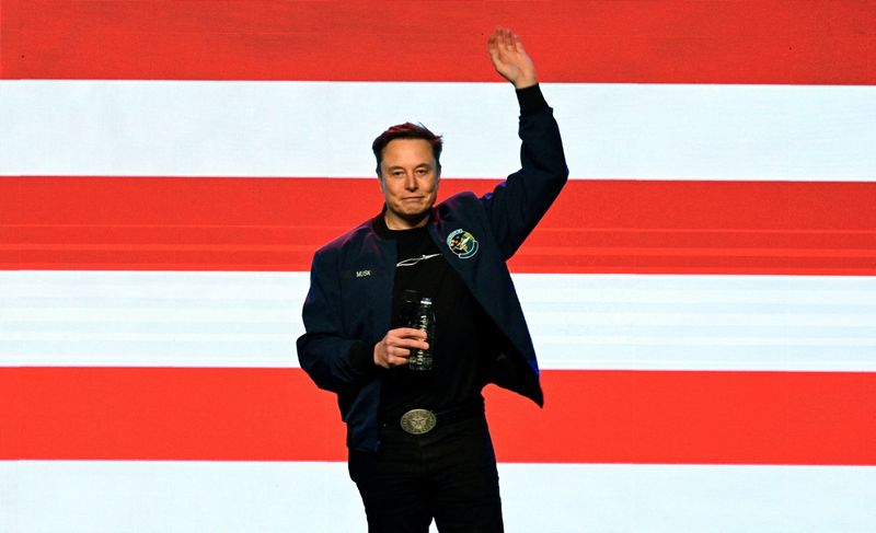 FILE PHOTO: U.S. President Donald Trump's adviser Elon Musk waves on the day of a rally in support of a conservative state Supreme Court candidate of an April 1 election in Green Bay, Wisconsin, U.S. March 30, 2025.  REUTERS/Vincent Alban/File Photo