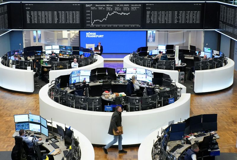 FILE PHOTO: The German share price index DAX graph is pictured at the stock exchange in Frankfurt, Germany, March 14, 2025.    REUTERS/Staff/File Photo