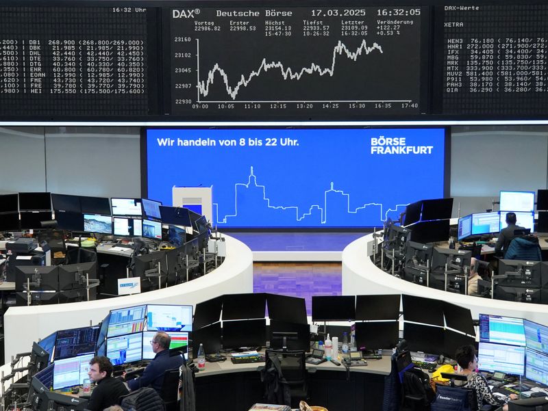 FILE PHOTO: The German share price index DAX graph is pictured at the stock exchange in Frankfurt, Germany, March 17, 2025.   REUTERS/Staff/File Photo