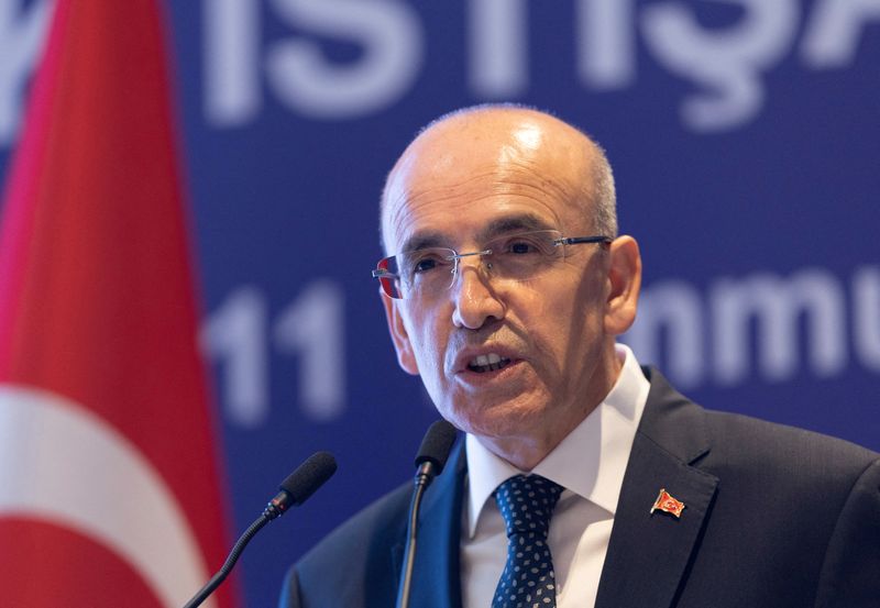 FILE PHOTO: Turkey's Finance Minister Mehmet Simsek speaks during a meeting of Turkish Industry and Business Association (TUSIAD) in Istanbul, Turkey, July 11, 2024. REUTERS/Murad Sezer/File Photo