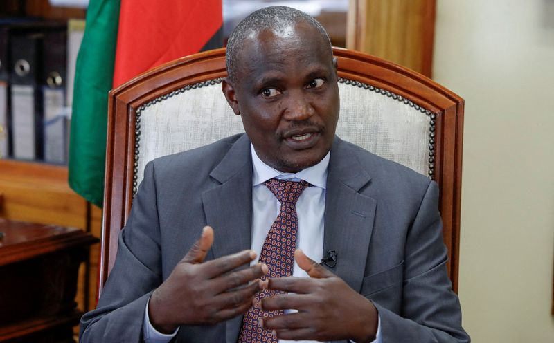 FILE PHOTO: Kenya's Finance Minister John Mbadi gestures during an interview with Reuters where he says Kenya has started talks with IMF for a new program, in Nairobi, Kenya, February 5, 2025. REUTERS/Monicah Mwangi/File Photo
