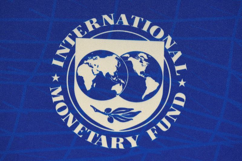 FILE PHOTO: The logo of the International Monetary Fund (IMF), is seen during a news conference in Santiago, Chile, July 23, 2019. REUTERS/Rodrigo Garrido