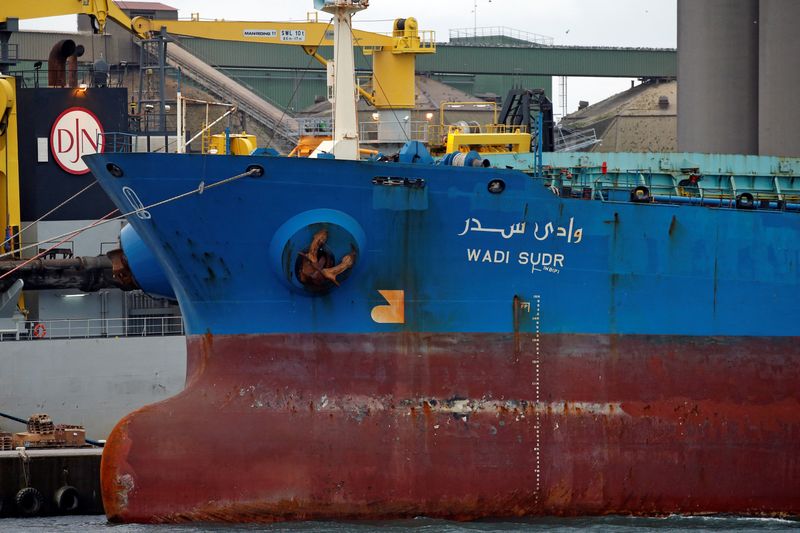 FILE PHOTO: A cargo ship is moored in the harbor of Dunkirk