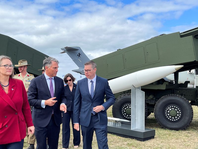 Erika Olson, Charge d’Affaires, for the United States Embassy in Australia with Australia’s Defence Minister Richard Marles, and Minister for Defence Industry Pat Conroy, at the Avalon Air Show, in Victoria, Australia March 24, 2025.  REUTERS/Kirsty Needham