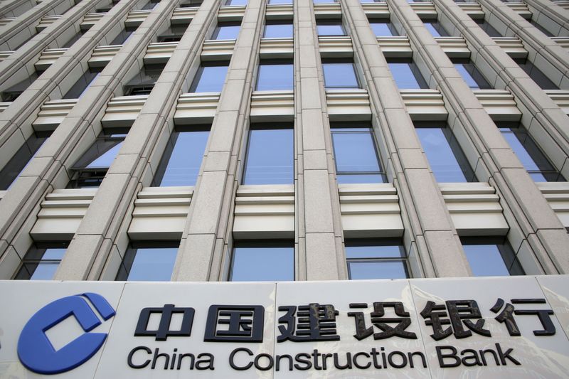 FILE PHOTO: A sign of China Construction Bank is seen at a branch in Beijing, China, April 21, 2016. REUTERS/Kim Kyung-Hoon/File Photo