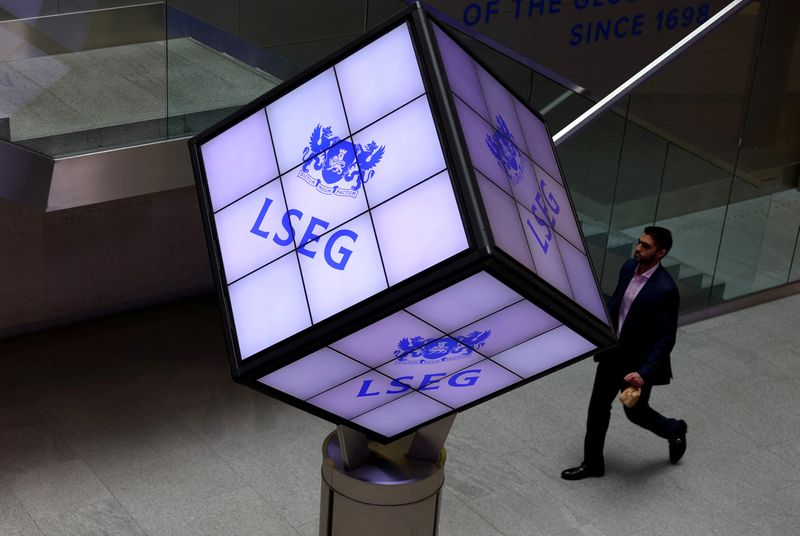 A man walks through the lobby of the London Stock Exchange in London, Britain, May 14, 2024. REUTERS/Hannah McKay/ File Photo