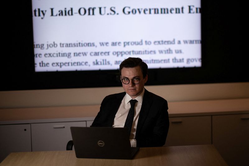 Max Lesser, a senior analyst on emerging threats at the Foundation for Defense of Democracies poses for a portrait at an office in Washington, D.C., U.S., March 24, 2025. REUTERS/Carlos Barria
