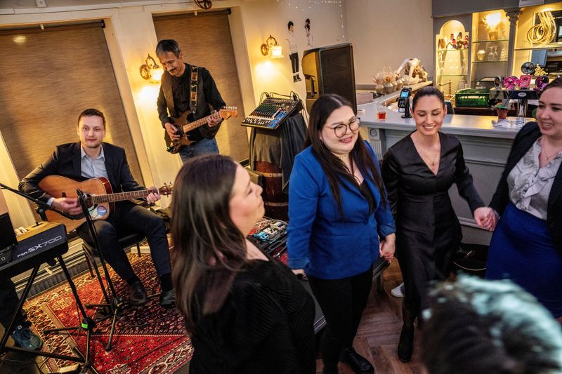 Leader of Demokraatit, Jens-Frederik Nielsen, reacts during the election party at cafe Killut in Nuuk