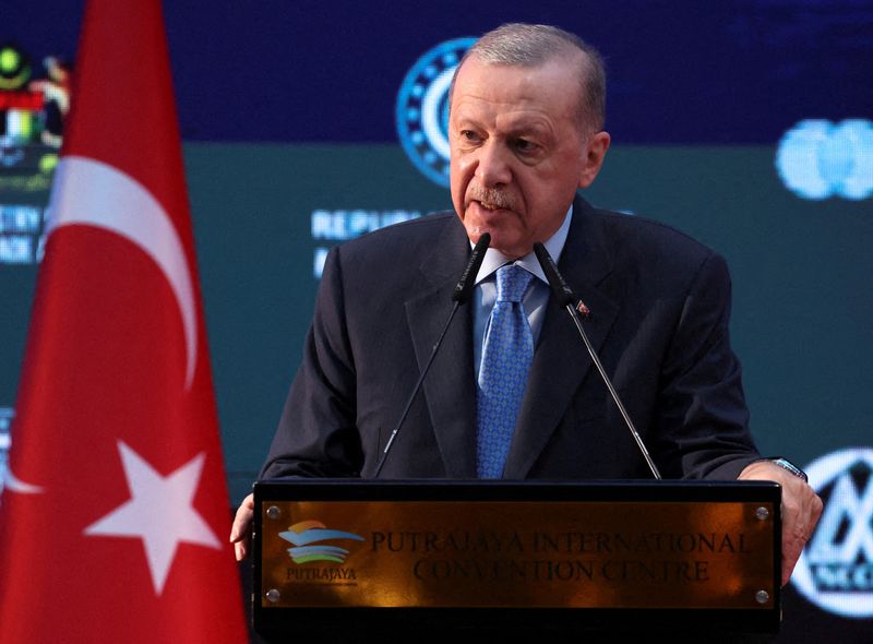 FILE PHOTO: Turkish President Tayyip Erdogan speaks at the Malaysia-Turkey Business Forum during his working visit to Malaysia, in Putrajaya, Malaysia, February 11, 2025. REUTERS/Hasnoor Hussain/File Photo