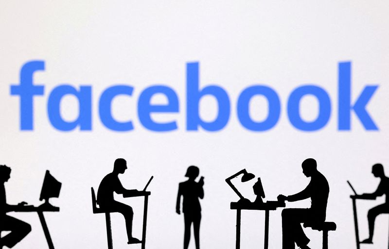 FILE PHOTO: Figurines with computers and smartphones are seen in front of Facebook logo in this illustration taken, February 19, 2024. REUTERS/Dado Ruvic/Illustration/File Photo