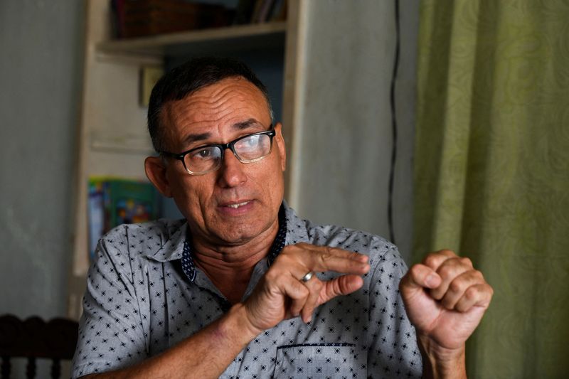 FILE PHOTO: Cuban dissident Jose Daniel Ferrer, founder of the Cuba’s National Patriotic Union (UNPACU) opposition group, speaks with Reuters during an interview at his home in Santiago, Cuba April 8, 2025. REUTERS/Norlys Perez/File Photo