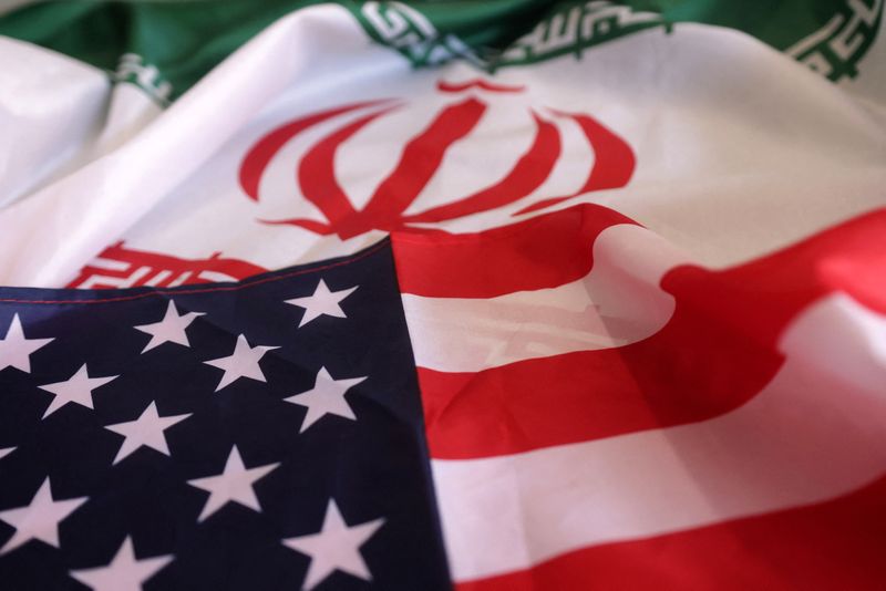 FILE PHOTO: USA and Iranian flags are seen in this illustration taken, September 8, 2022. REUTERS/Dado Ruvic/Illustration/File photo