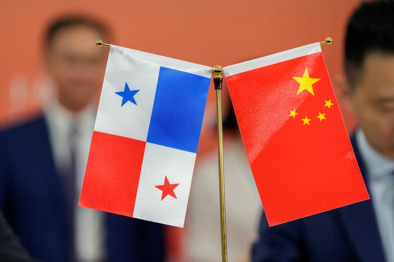 The flags of Panama and China are seen during a meeting held with Chinese and Panamanian companies to sign several trade agreements, in Panama City, Panama August 26, 2024. REUTERS/Enea Lebrun/File Photo