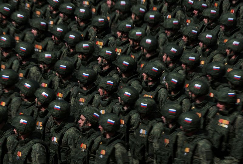 Russian soldiers, who were involved in the country's military campaign in Ukraine, march in columns during a parade on Victory Day, marking the 80th anniversary of the victory over Nazi Germany in World War Two, in Red Square in central Moscow, Russia, May 9, 2025. REUTERS/Anton Vaganov