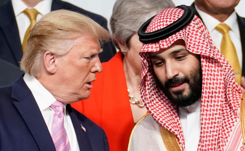FILE PHOTO: U.S. President Donald Trump speaks with Saudi Arabia's Crown Prince Mohammed bin Salman at a G20 summit in Japan, June 28, 2019.  REUTERS/Kevin Lamarque/File Photo