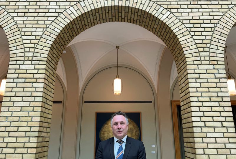 Norwegian Defence Minister Tore O. Sandvik poses for a picture at the Norwegian Parliament in Oslo, Norway, March 19, 2025. REUTERS/Gwladys Fouche