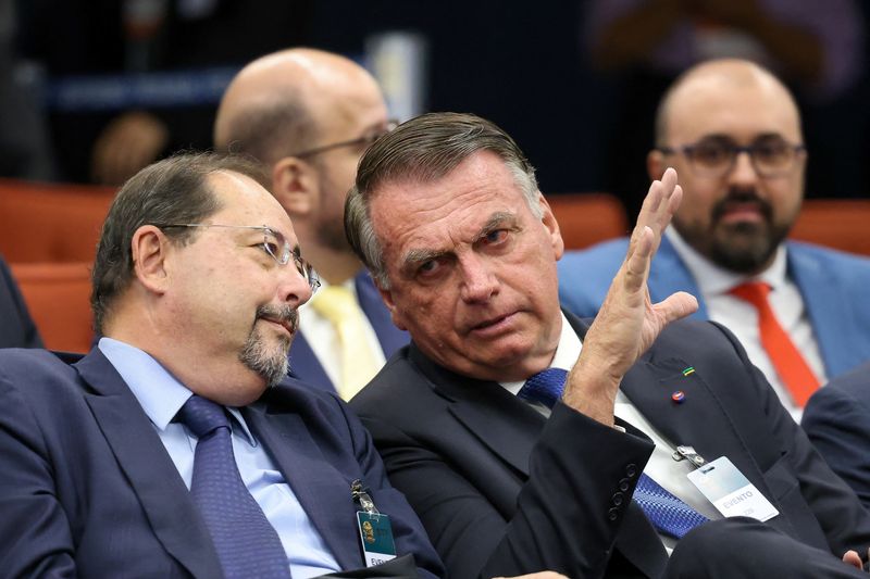 Brazil's former President Jair Bolsonaro attends a session of the Supreme Court as it deliberates if the former President and some of his closest aides should stand trial for allegedly attempting a coup, in Brasilia, Brazil, March 25, 2025. Gustavo Moreno/Brazilian Supreme Court/Handout via REUTERS