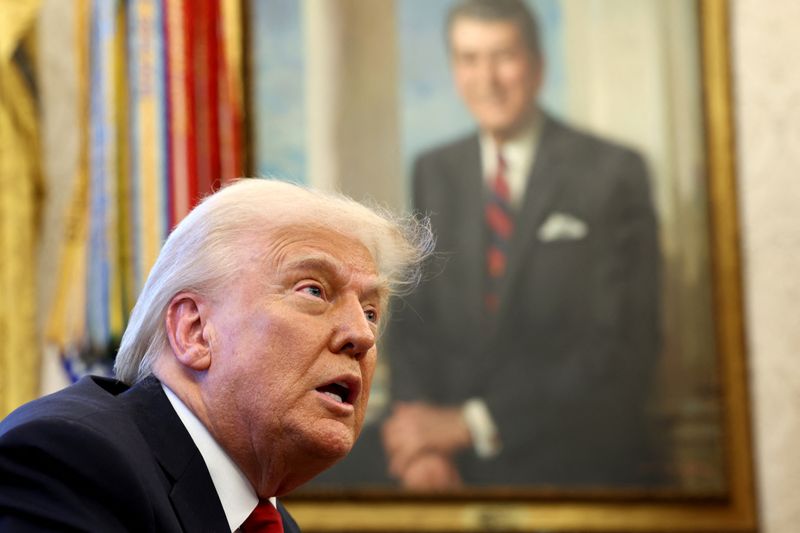 U.S. President Donald Trump speaks to the media in the Oval Office at the White House in Washington, D.C., U.S., March 26, 2025. REUTERS/Evelyn Hockstein