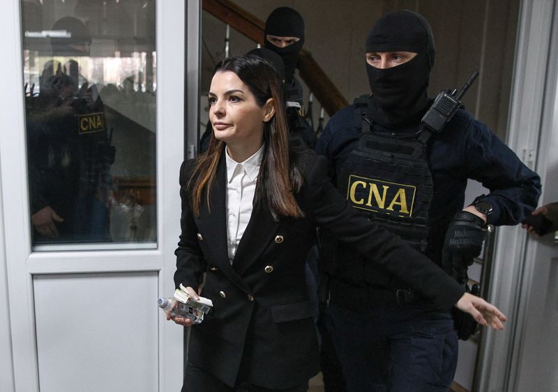 Leader of Moldova's Gagauzia autonomous region Eugenia Gutul (Yevgenia Gutsul), who was detained in connection with a criminal case into corruption in the financing of a pro-Russian electoral bloc, is escorted in a court building in Chisinau, Moldova, March 28, 2025. REUTERS/Vladislav Culiomza