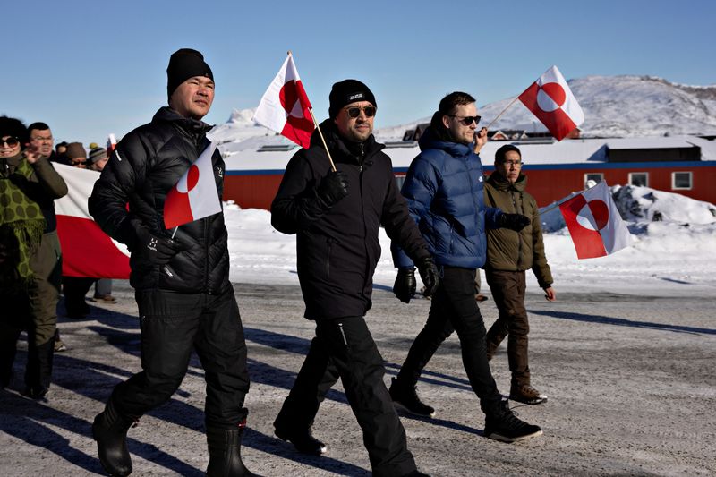 FILE PHOTO: Leader of the party IA Mute B. Egede, and the leader of the political party Demokraatit, Jens-Frederik Nielsen, are seen among the protesters at a demonstration march ending in front of the U.S. consulate, under the slogan, "Greenland belongs to the Greenlandic people", in Nuuk, Greenland, March 15, 2025  Christian Klindt Soelbeck/Ritzau Scanpix/via REUTERS/File Photo