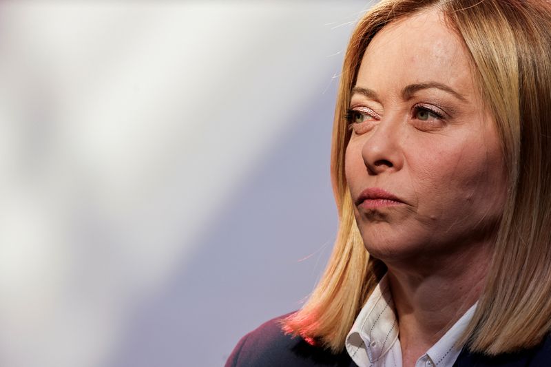 FILE PHOTO: Italy's Prime Minister Giorgia Meloni looks on before posing for a family picture as part of a summit for "Coalition of the Willing" at Elysee Palace in Paris, France March 27, 2025. Ludovic Marin/Pool via REUTERS/File Photo