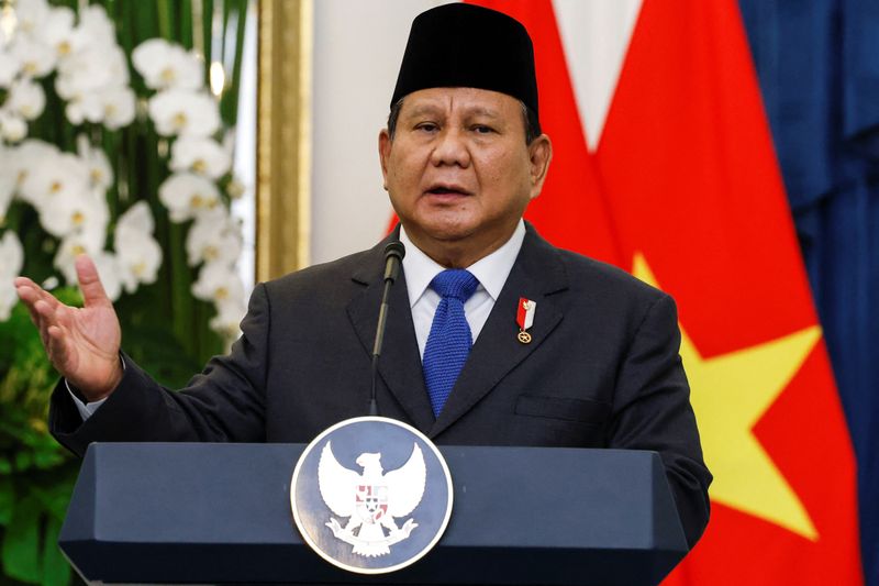 FILE PHOTO: Indonesian President Prabowo Subianto speaks during a press conference with Vietnam's Communist Party General Secretary To Lam (not pictured), at the Merdeka Palace in Jakarta, Indonesia, March 10, 2025. REUTERS/Ajeng Dinar Ulfiana/File Photo
