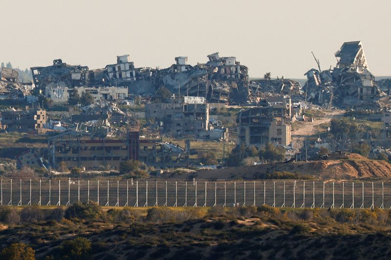 FILE PHOTO: General view of destroyed buildings in North Gaza, as seen from the Israel-Gaza border, March 23, 2025. REUTERS/Amir Cohen/File Photo