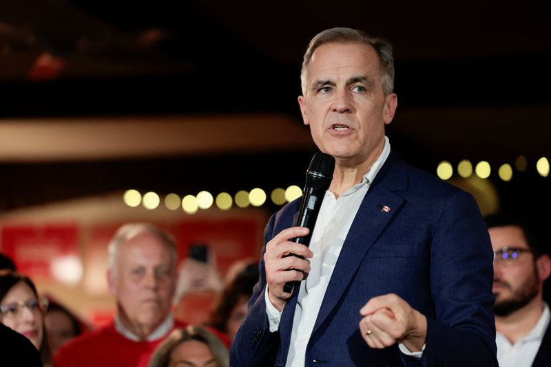 FILE PHOTO: Canada's Prime Minister Mark Carney speaks at the Victoria Edelweiss Club during his Liberal Party election campaign tour in Victoria, British Columbia, Canada April 6, 2025. REUTERS/Kevin Light/File Photo
