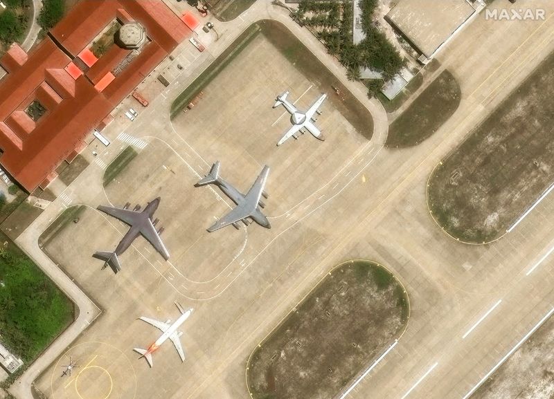 A KJ-500 early warning plane along with Y-20 transport aircraft are parked on the tarmac of an airfield on Woody Island, in the disputed Paracel archipelago, which is known in China as Xisha Islands, South China Sea, May 19, 2025. MAXAR TECHNOLOGIES/Handout via REUTERS