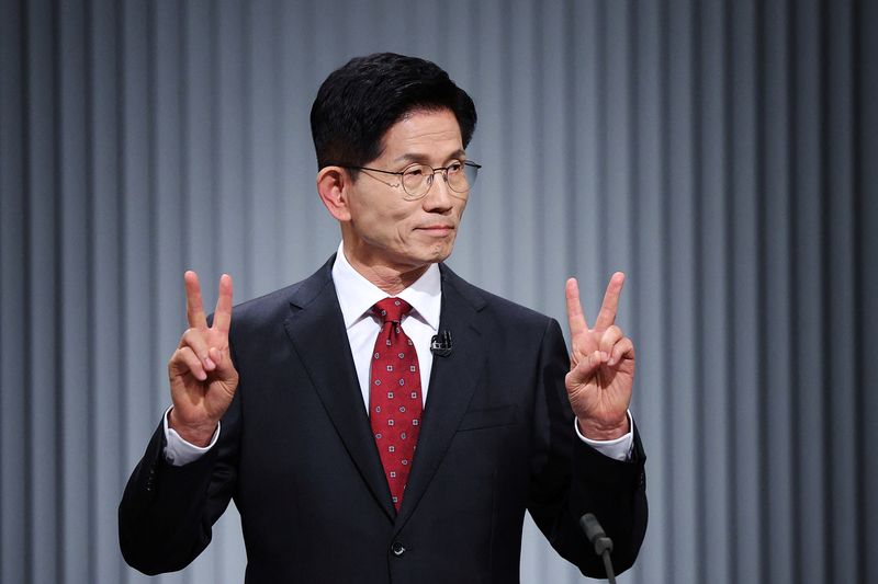 Kim Moon-soo, the presidential candidate for South Korea's conservative People Power Party, prepares for the second televised debate for the upcoming presidential election in Seoul, South Korea, May 23, 2025. REUTERS/Kim Hong-Ji/Pool/File Photo