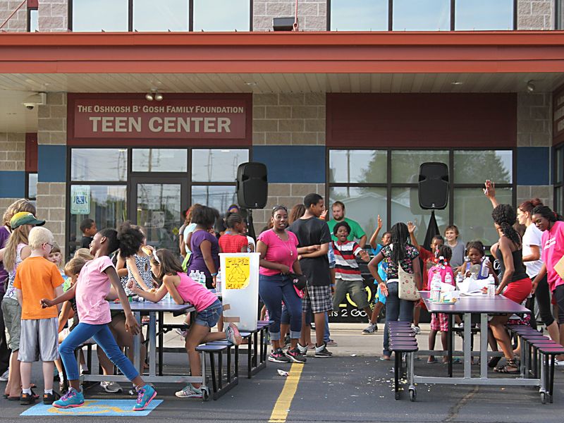 Oshkosh promotes safety in the community Aug. 5, 2014, as over a dozen locations held a Neighborhood Night Out. The Boys & Girls Club was there with fun and games to those attending.