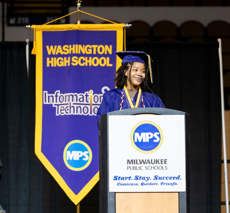 Washington High School of Information Technology valedictorian Jessica Brown delivers the student address to the class of 2024 during the graduation ceremony on May 23, 2024, at the UWM Panther Arena in Milwaukee.