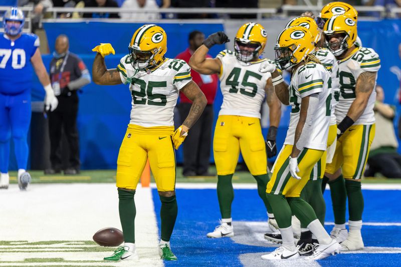Green Bay Packers cornerback Keisean Nixon (25) celebrates his third-quarter interception against the Detroit Lions on Thursday, Dec. 5, 2024, at Ford Field.