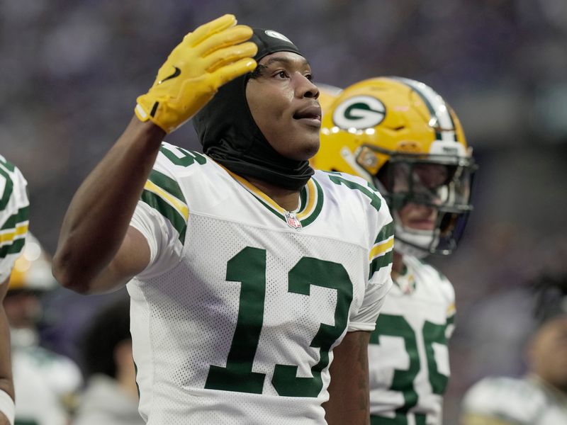 Green Bay Packers wide receiver Dontayvion Wicks (13) is shown before their game Sunday, December 29, 2024 at U.S. Bank Stadium in Minneapolis, Minnesota. The Minnesota Vikings beat the Green Bay Packers 27-25.
