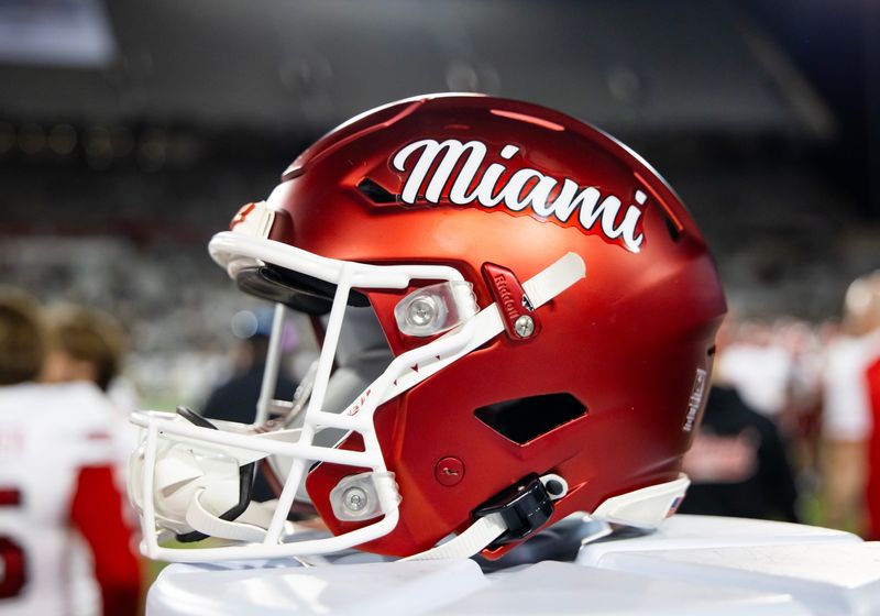 Dec 28, 2024; Tucson, AZ, USA; Detailed view of a Miami (OH) RedHawks helmet during the Snoop Dogg Arizona Bowl at Arizona Stadium. Mandatory Credit: Mark J. Rebilas-Imagn Images