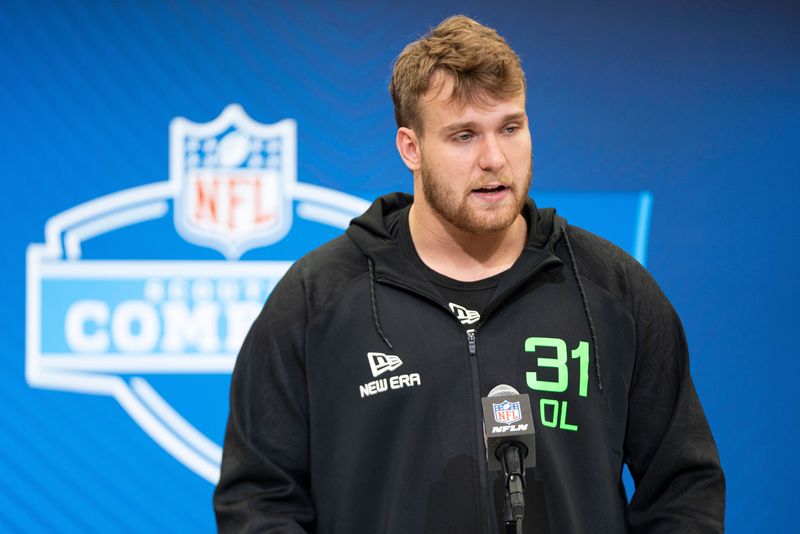 Mar 1, 2025; Indianapolis, IN, USA; University of Wisconsin offensive lineman Jack Nelson (OL31) answers questions at a press conference during the 2025 NFL Combine at Indiana Convention Center. Mandatory Credit: Jacob Musselman-Imagn Images