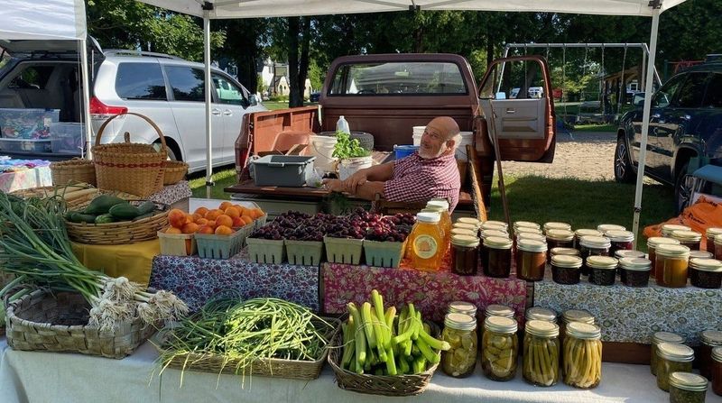 Randy Manges mans the Big Dog Farm stand, one of the more than 30 local vendors who will come weekly to the Jacksonport Farmers Market.